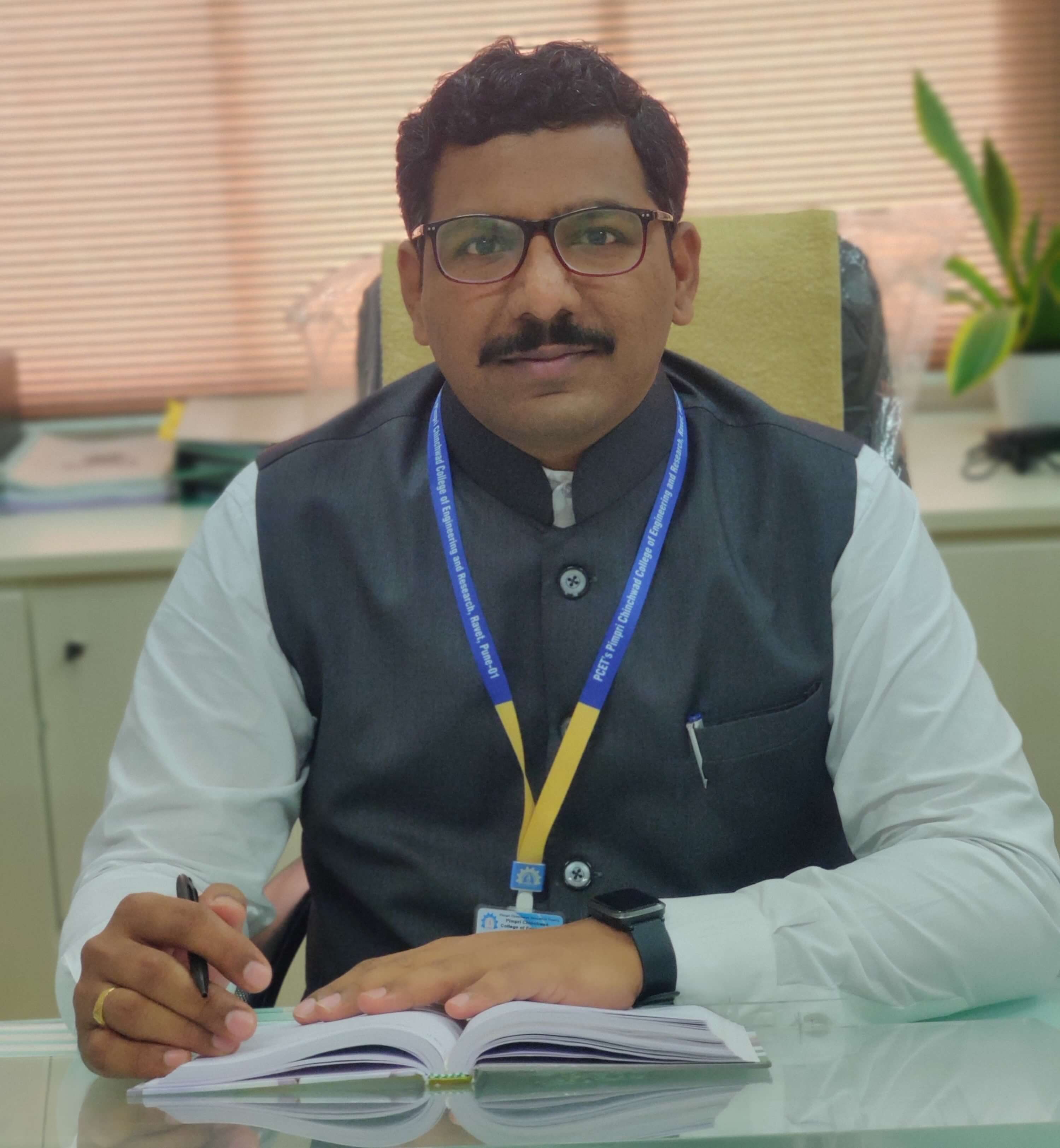 Dr. Sudarshan Bobade