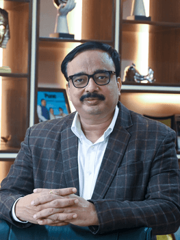 Executive Director of PCET Trust Dr. Girish Desai